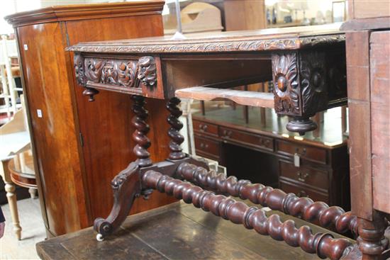 Late 19th century heavily carved oak writing table A/F